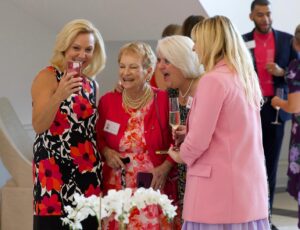 AOII Alumnae members laughing